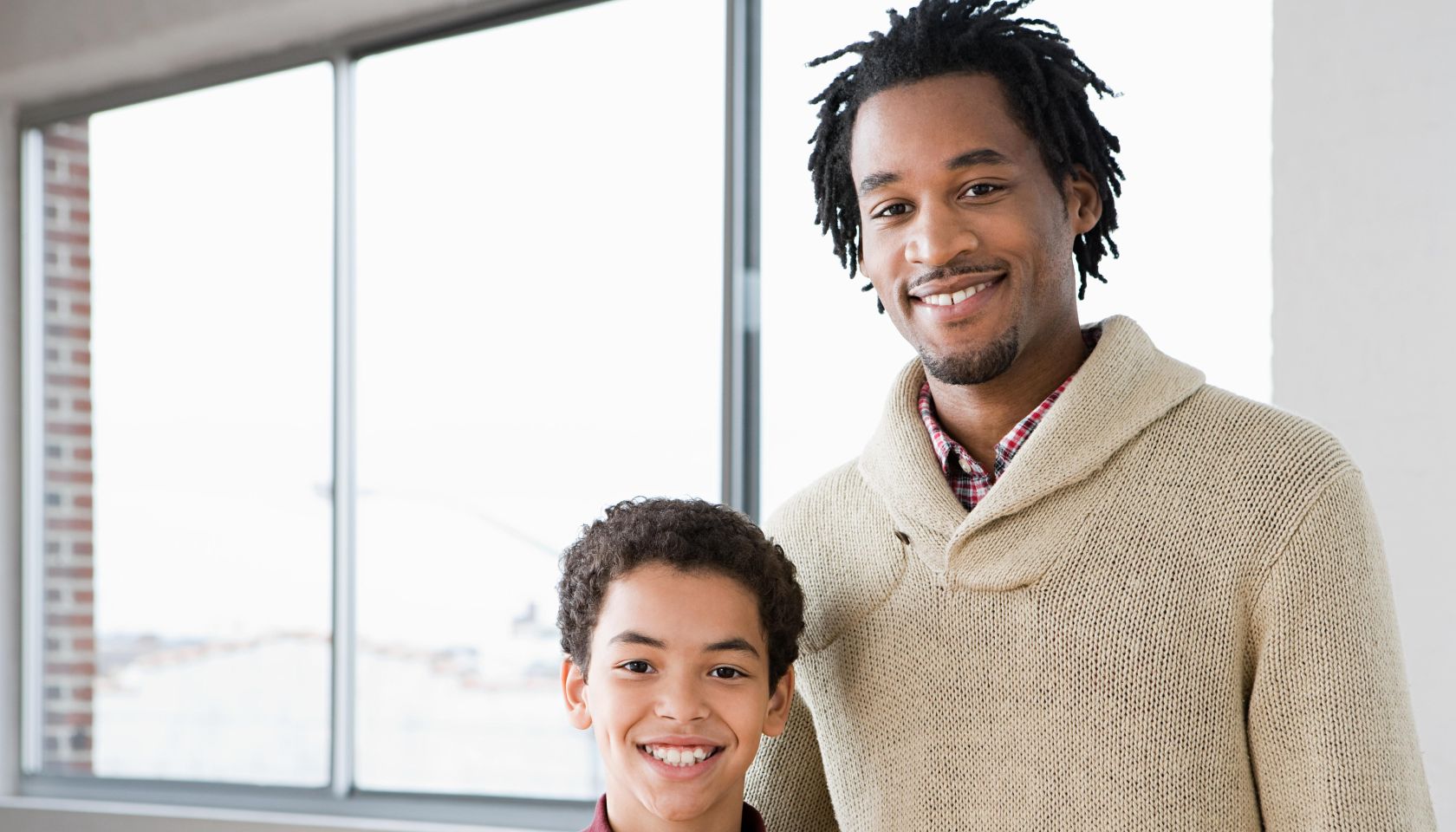 Man mentoring boy