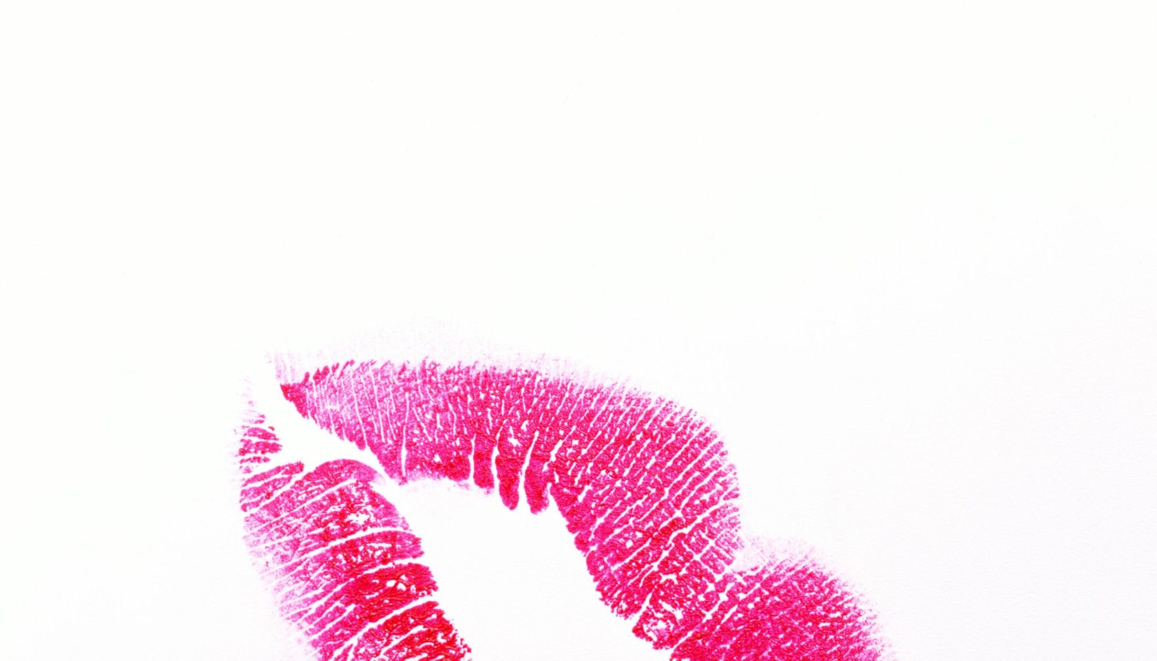 Lipstick kiss on white background