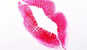 Lipstick kiss on white background