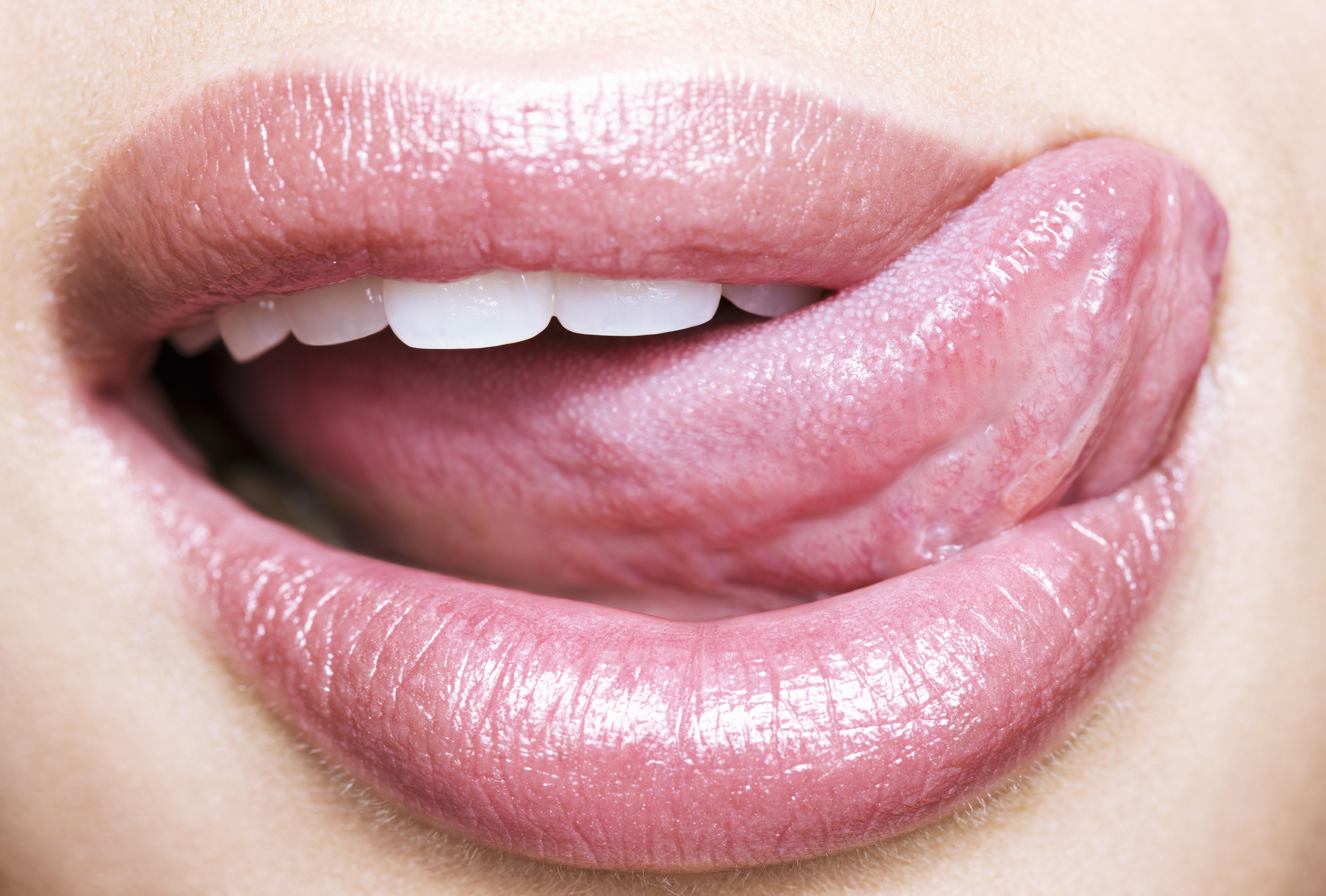 Woman licking lips, Close up of a woman's mouth