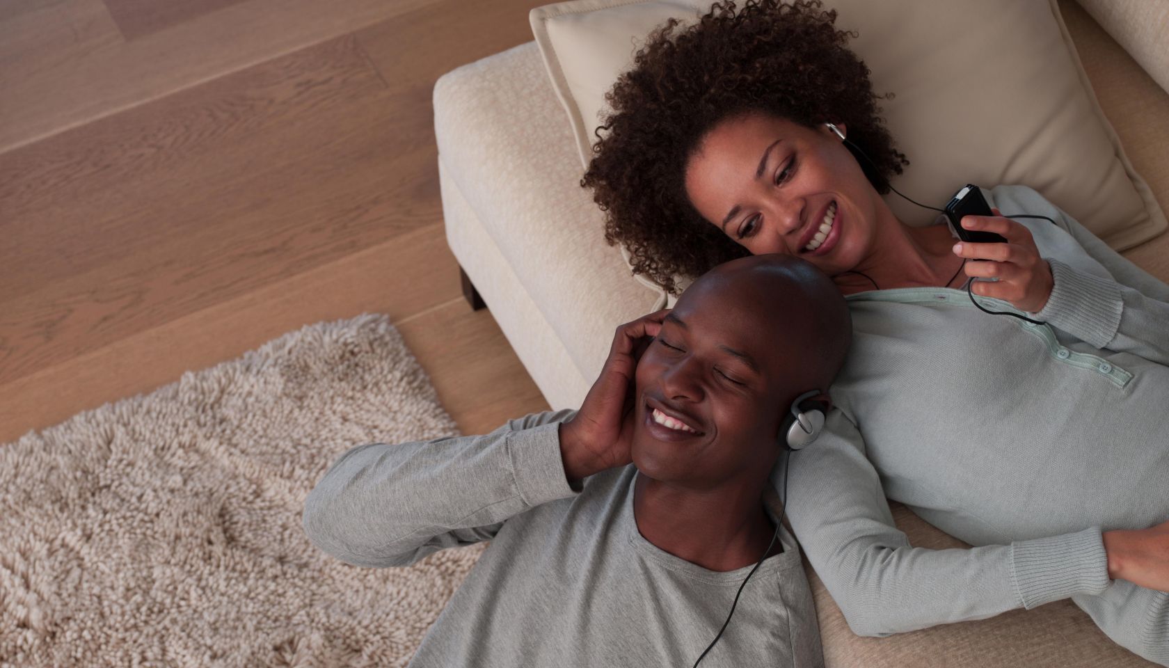 A couple listening to music together