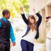 Office worker team does victory dance after receiving good news