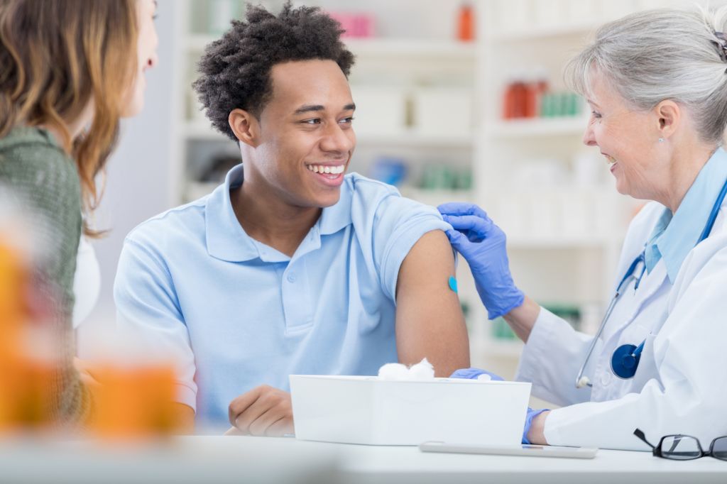 African American receives flu vaccine