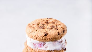 Close-Up Of Ice Cream Sandwiches In Plate Against White Background