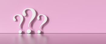 Question Mark Icon Against Pink Background