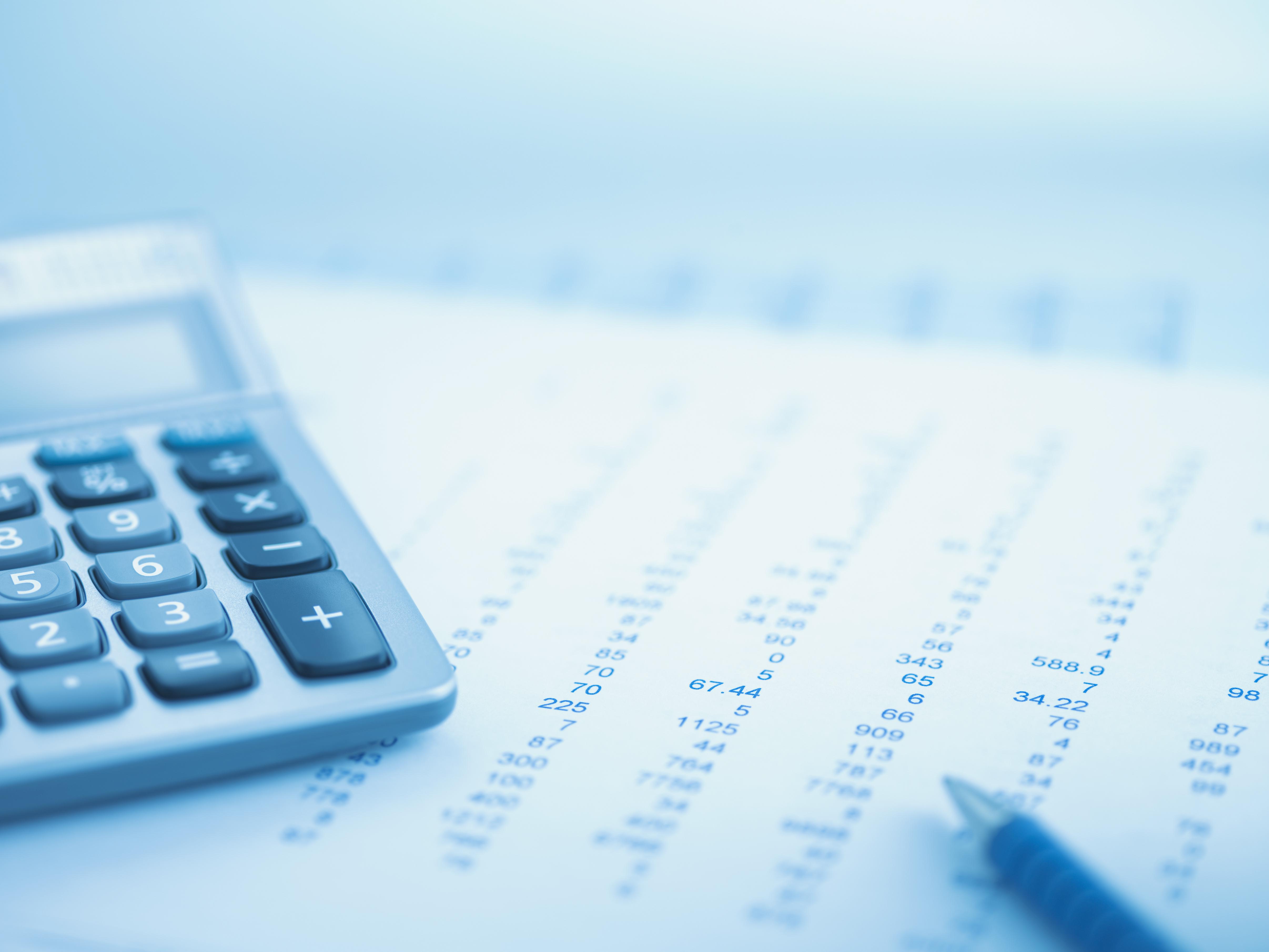 Close up of calculator and data