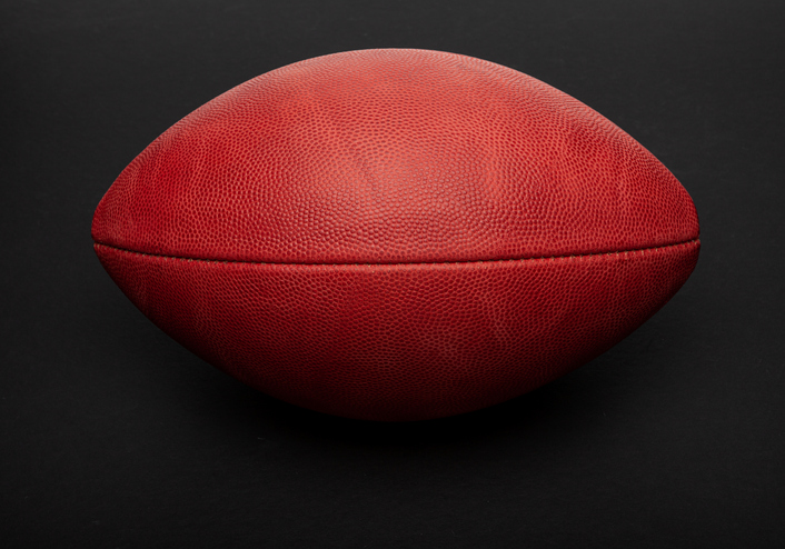 Football shot in studio on black background